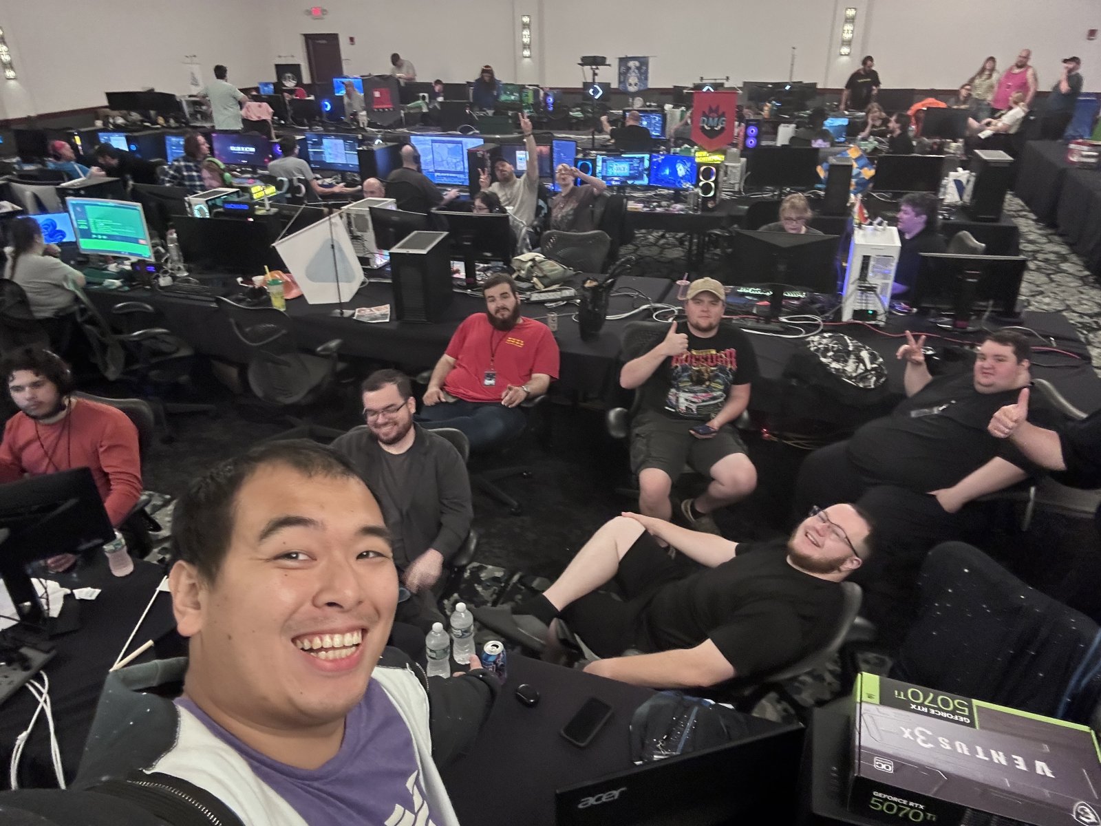 Group selfie in BYOC hall at gaming event