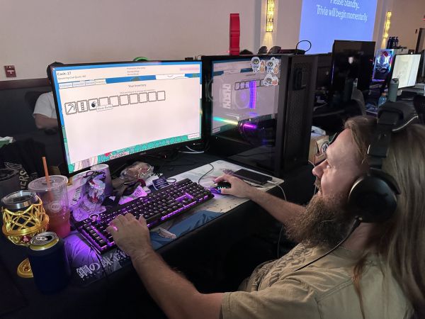 Player at Computer During Trivia Night