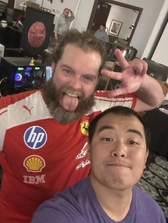 Two attendees taking a selfie in the BYOC area