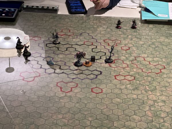 Tabletop game with miniatures on hex grid map