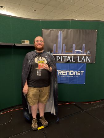 Attendee wearing a starry cape at Capital LAN